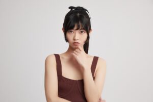 japanese woman thinking choice decision