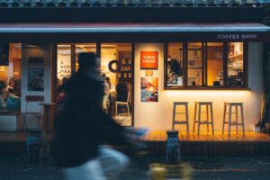 japanese woman smartphone evening cafe
