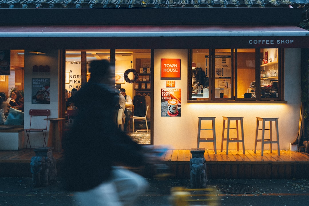 japanese woman smartphone evening cafe