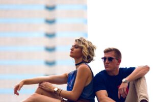 man woman thinking dating app