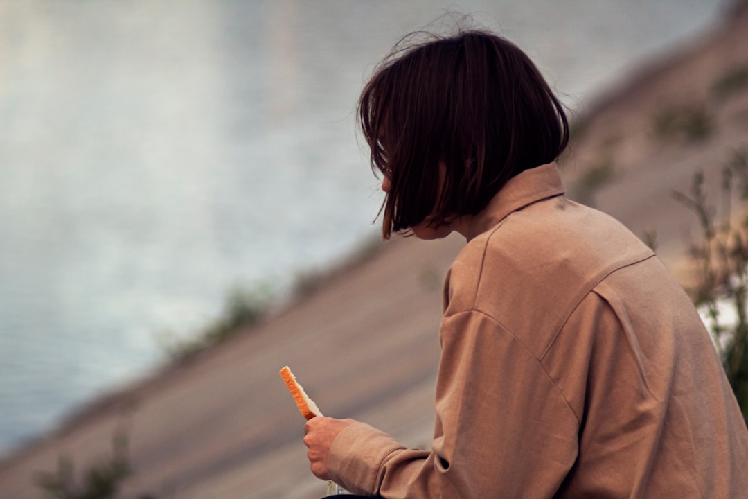 japanese woman writing smartphone profile