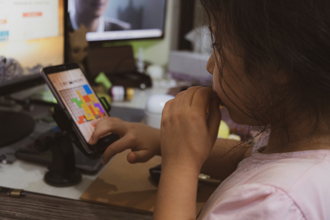 woman comparing apps phone tablet