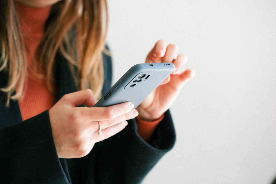woman multiple smartphones apps