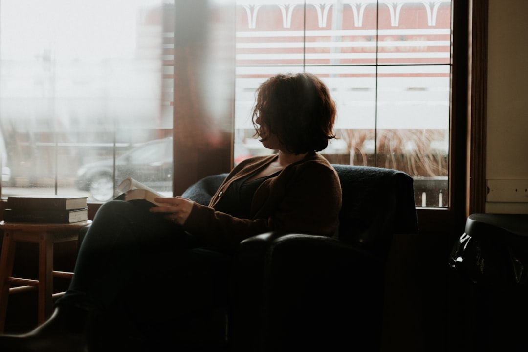 woman thinking window reflection