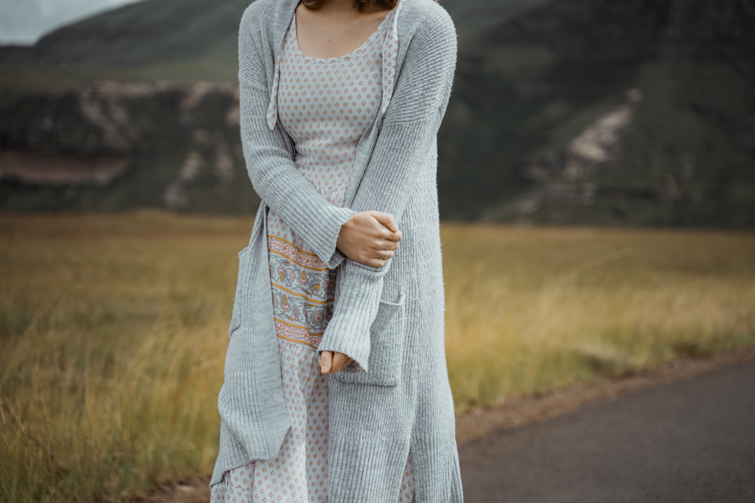 woman outfit pastel dress cardigan