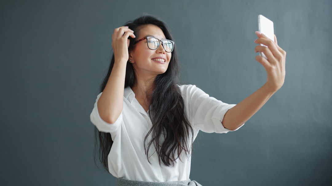 woman taking selfie natural light