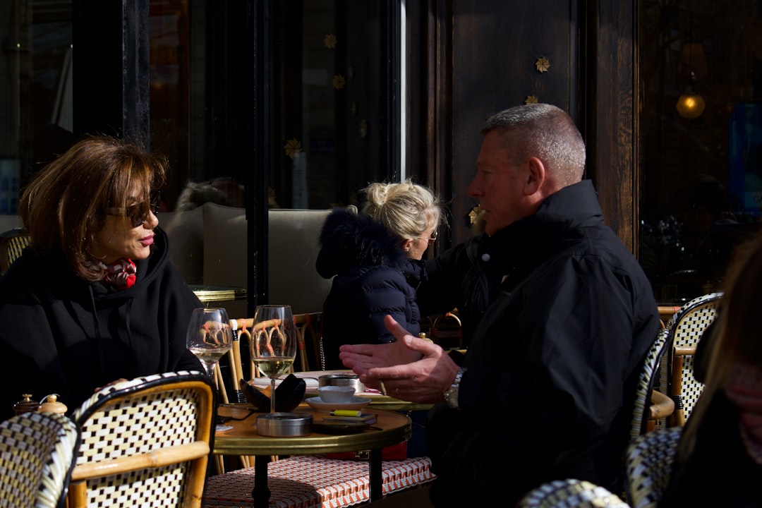 middle aged couple smiling cafe natural light
