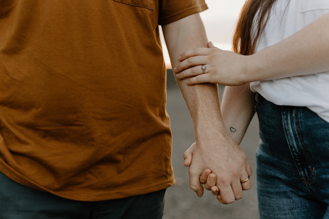 couple holding hands serious commitment