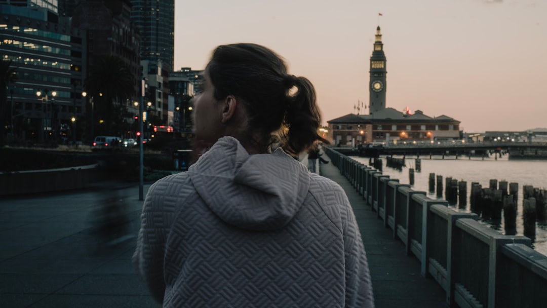 woman walking city evening calm