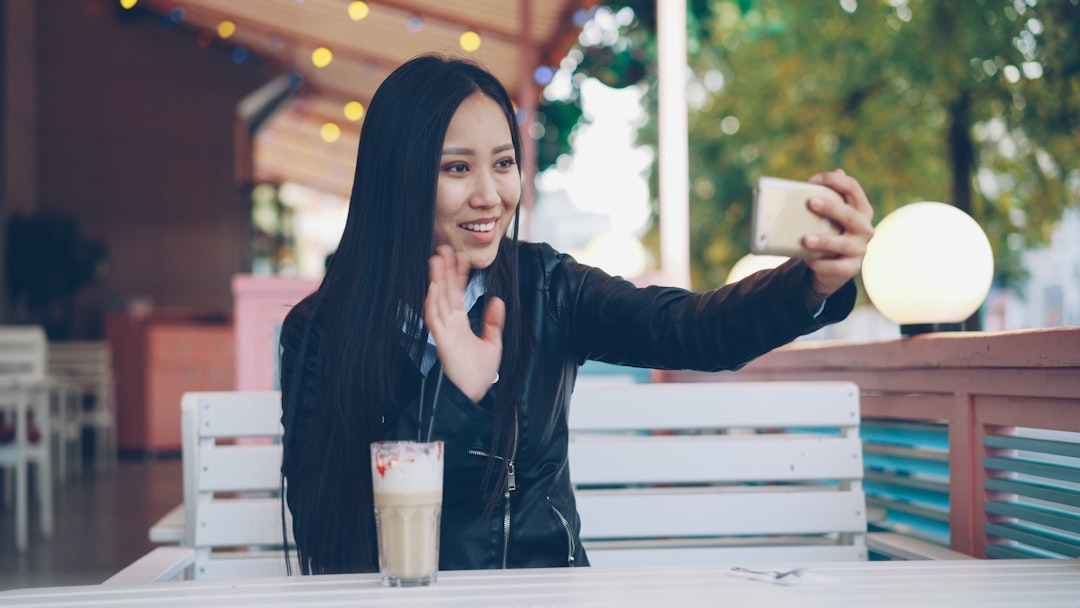 japanese woman smartphone cafe night