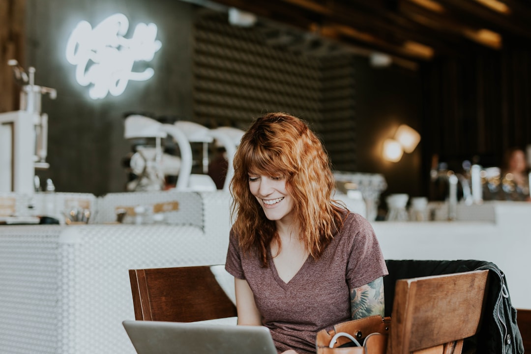 japanese woman smiling cafe laptop