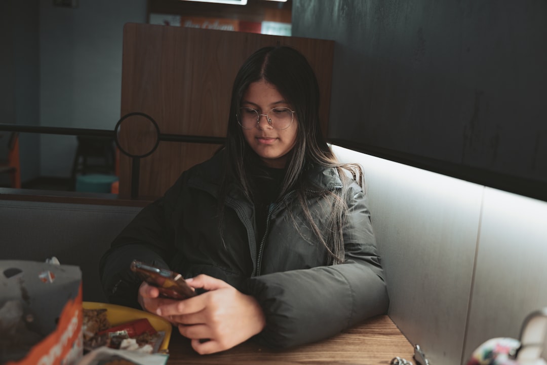 woman smartphone night home