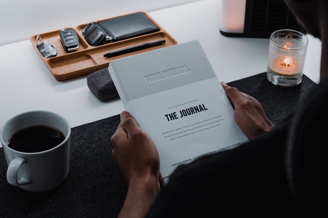 woman thinking journal coffee
