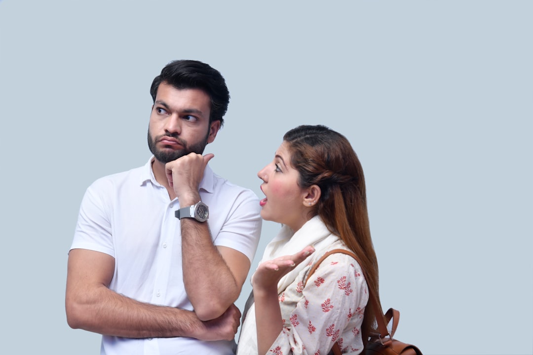 man and woman serious talk couple