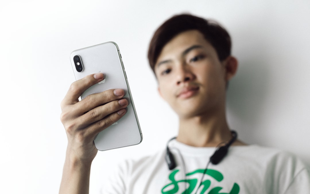 japanese man smartphone happy