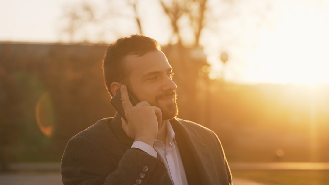 man thinking phone dating