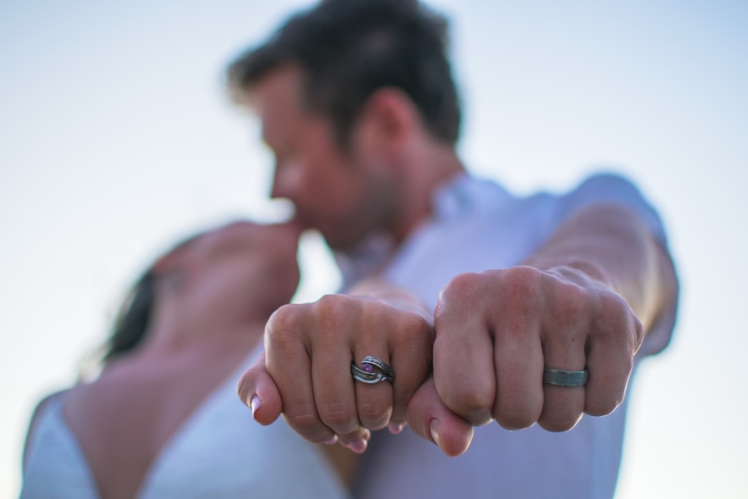 wedding ring couple hands serious