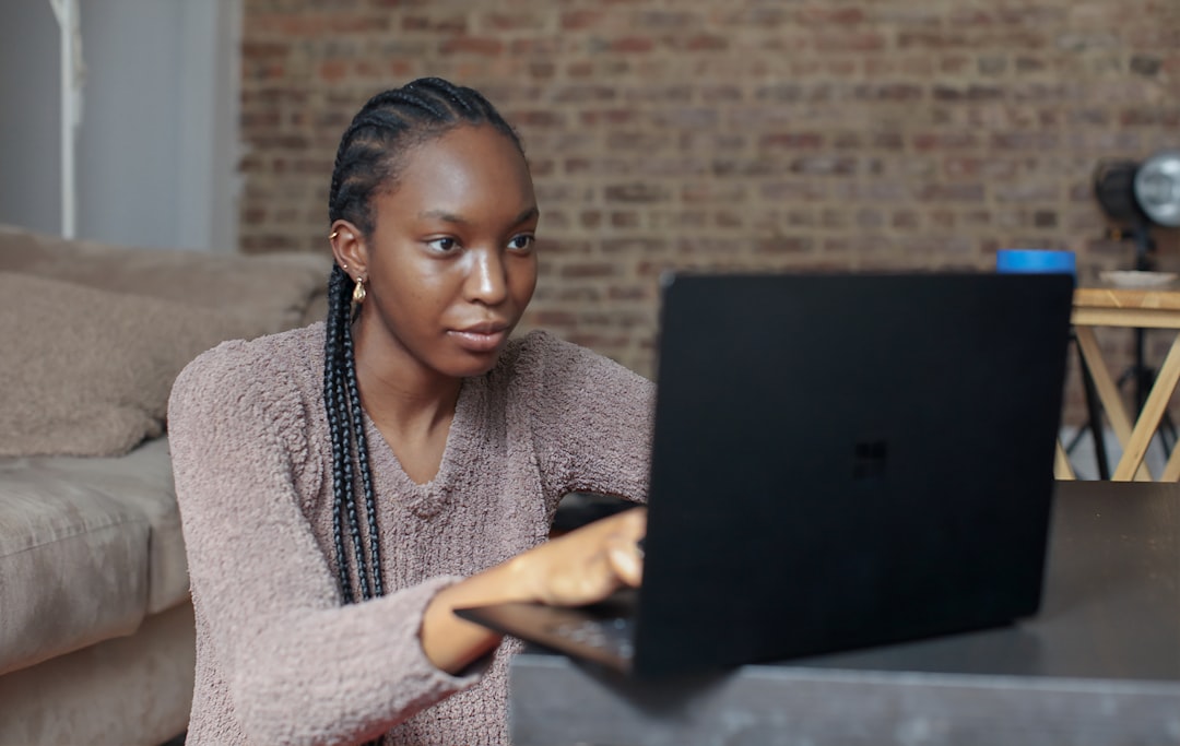 young woman taking action laptop notebook decision