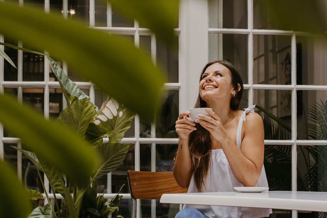 japanese woman smiling relieved coffee