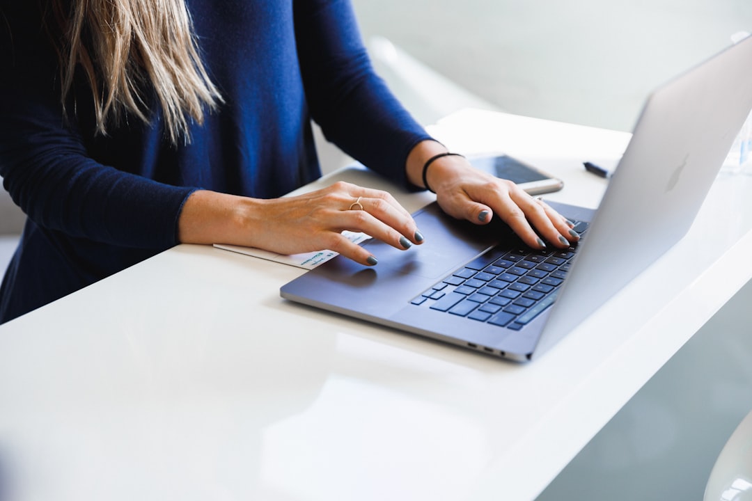woman comparing options laptop notebook