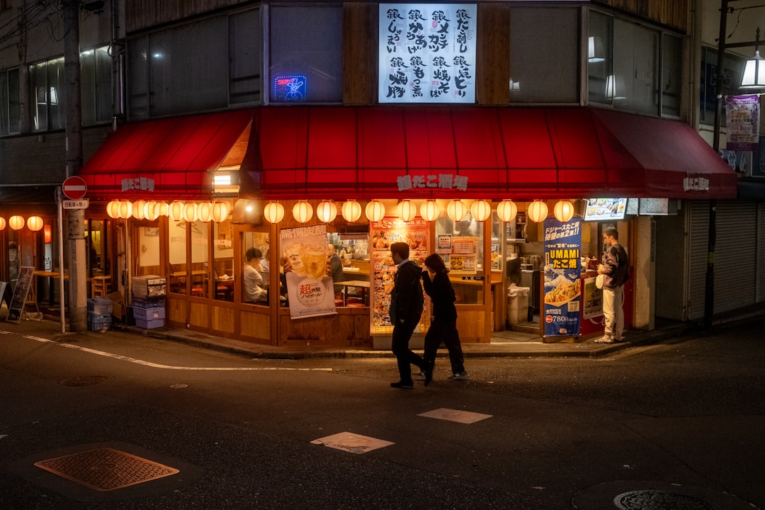 couple saying goodbye evening street tokyo