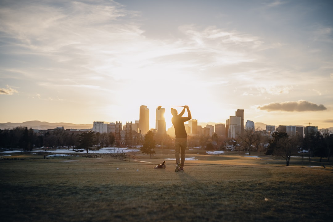 mother daughter holding hands park sunset
