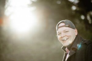 man casual portrait outdoor smile natural light