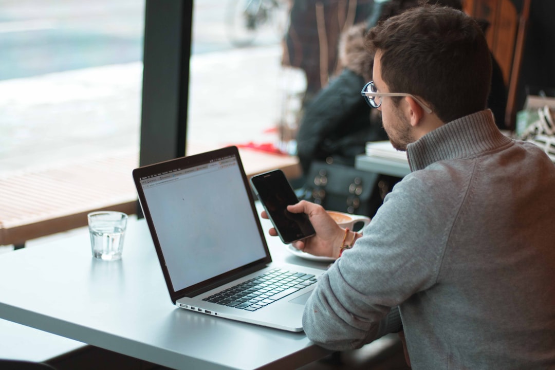 man working laptop coffee shop