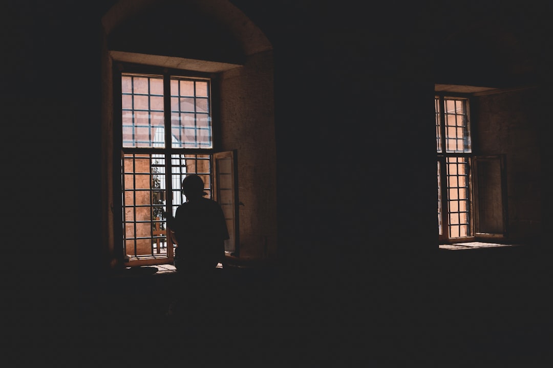 lonely woman window evening reflection
