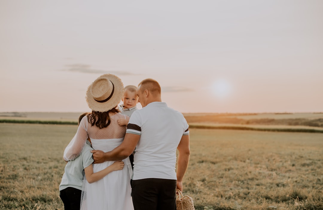 happy family three people sunset