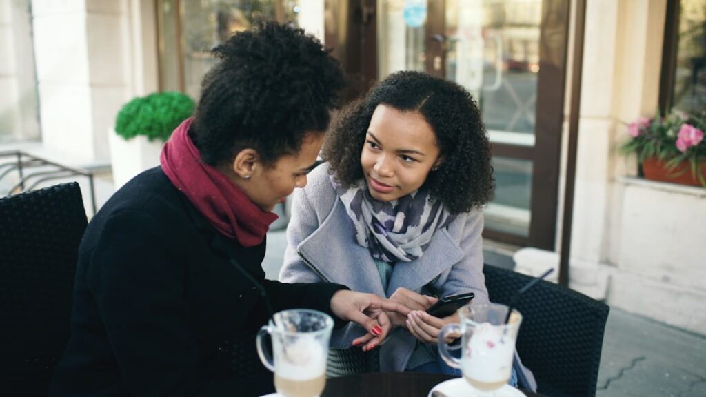 woman smartphone dating app frustrated cafe