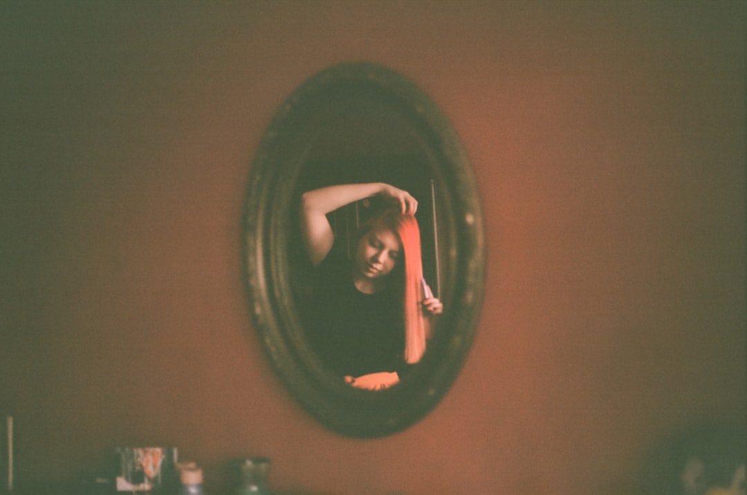 woman feeling exhausted reflection mirror