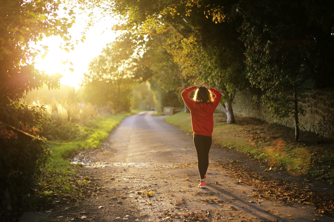 woman walking sunrise refreshed mood