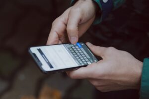 smartphone dating app message man typing