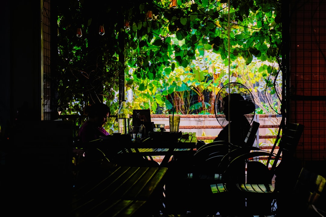 man portrait natural light cafe