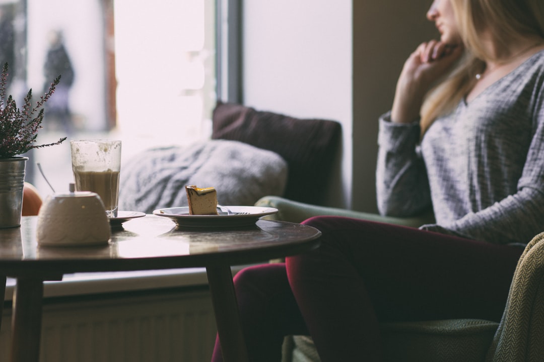 young woman thinking confident cafe
