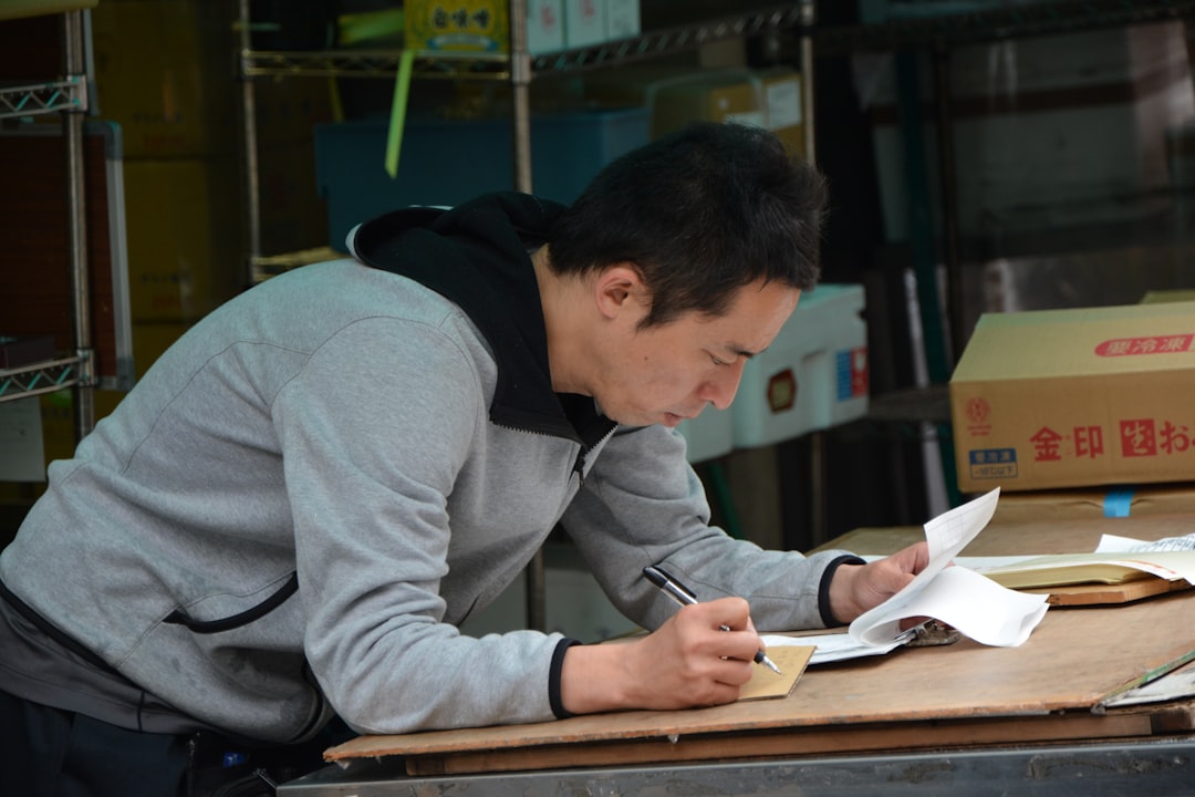 writing notebook coffee japanese man