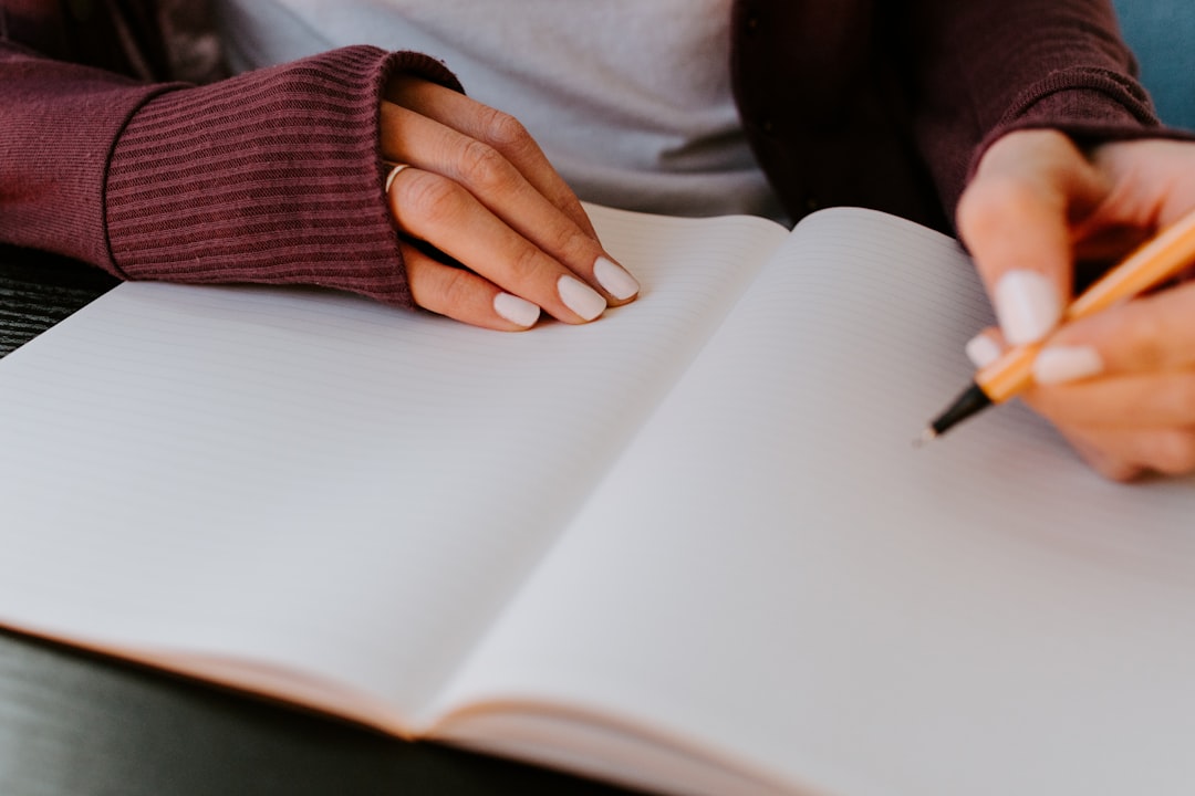 japanese woman writing notebook journal