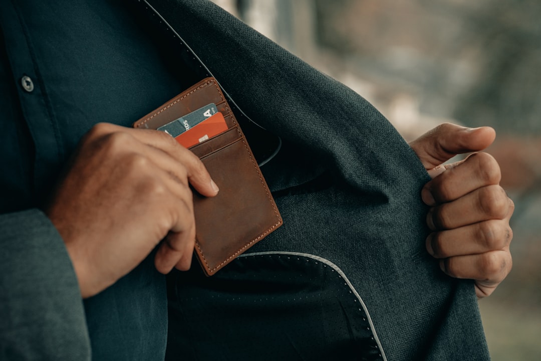 man wallet smartphone payment