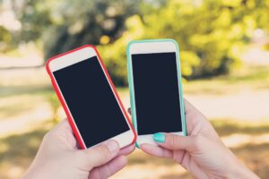 two smartphones dating app comparison