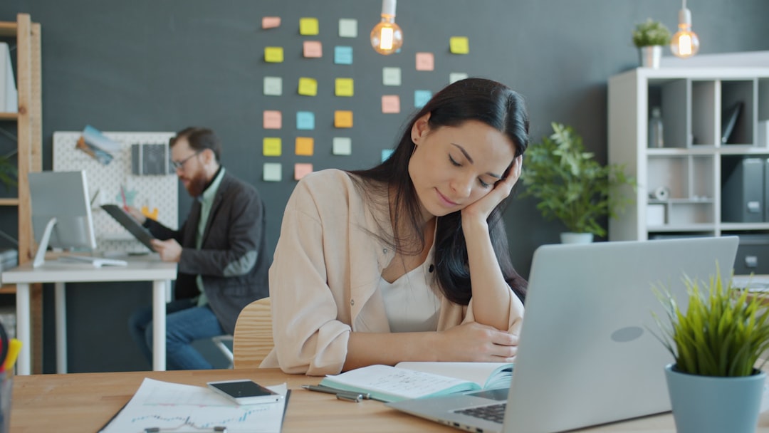 tired businesswoman working late office