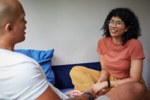 marriage counselor supporting couple