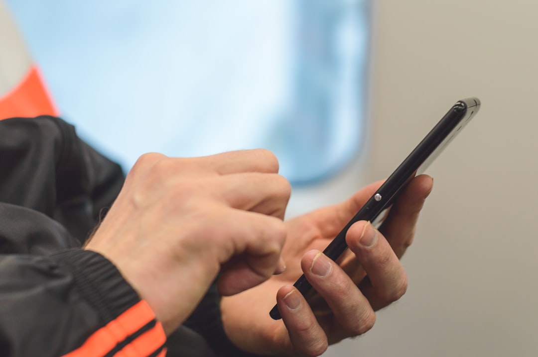 person adjusting privacy settings on phone