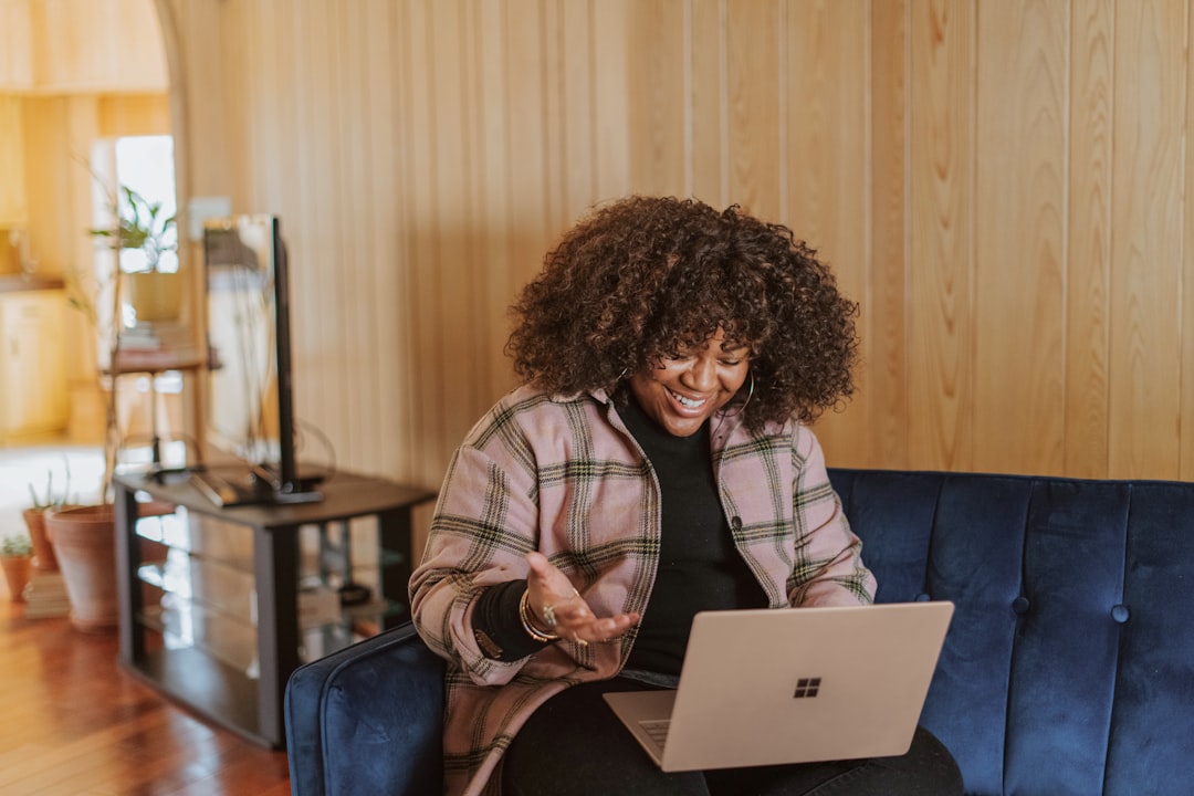 person comparing price plans on laptop
