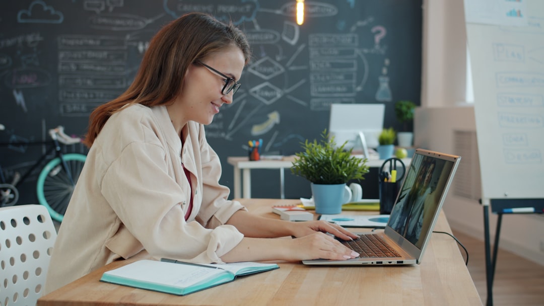 online video call laptop home desk