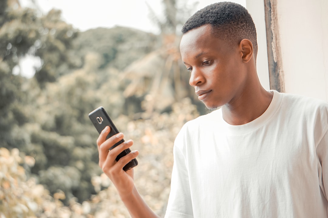 person looking disappointed at phone