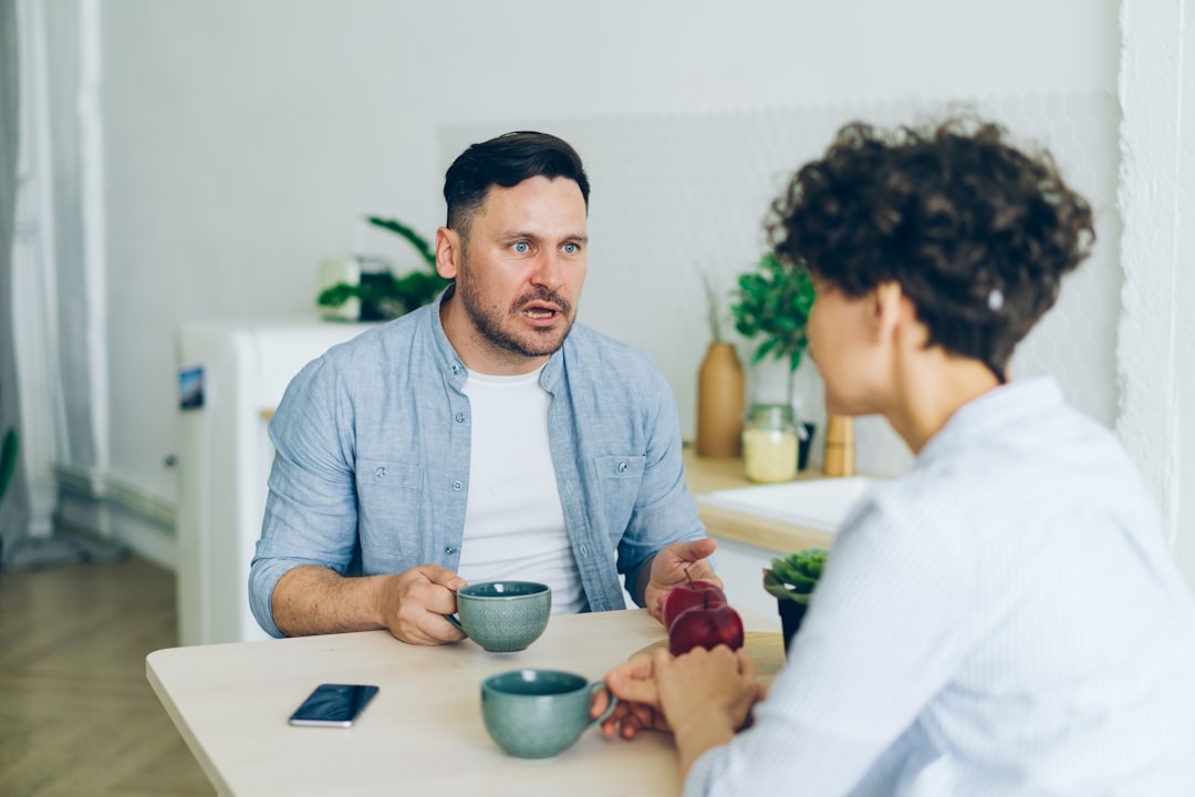 couple having serious conversation cafe
