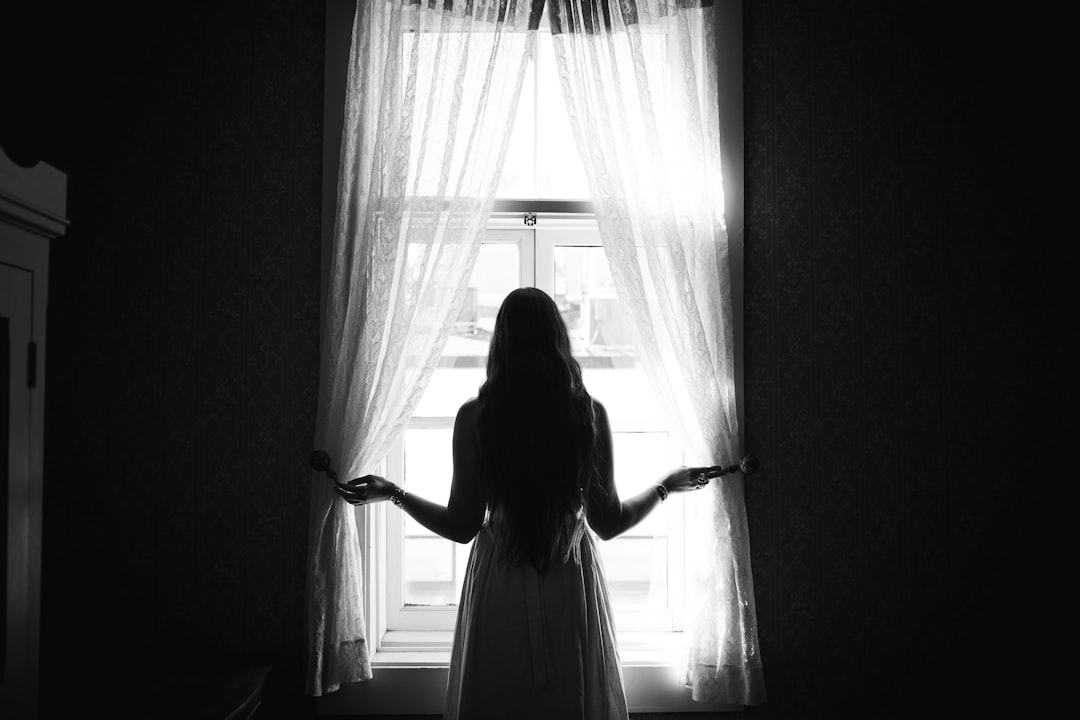 woman confident decision window light