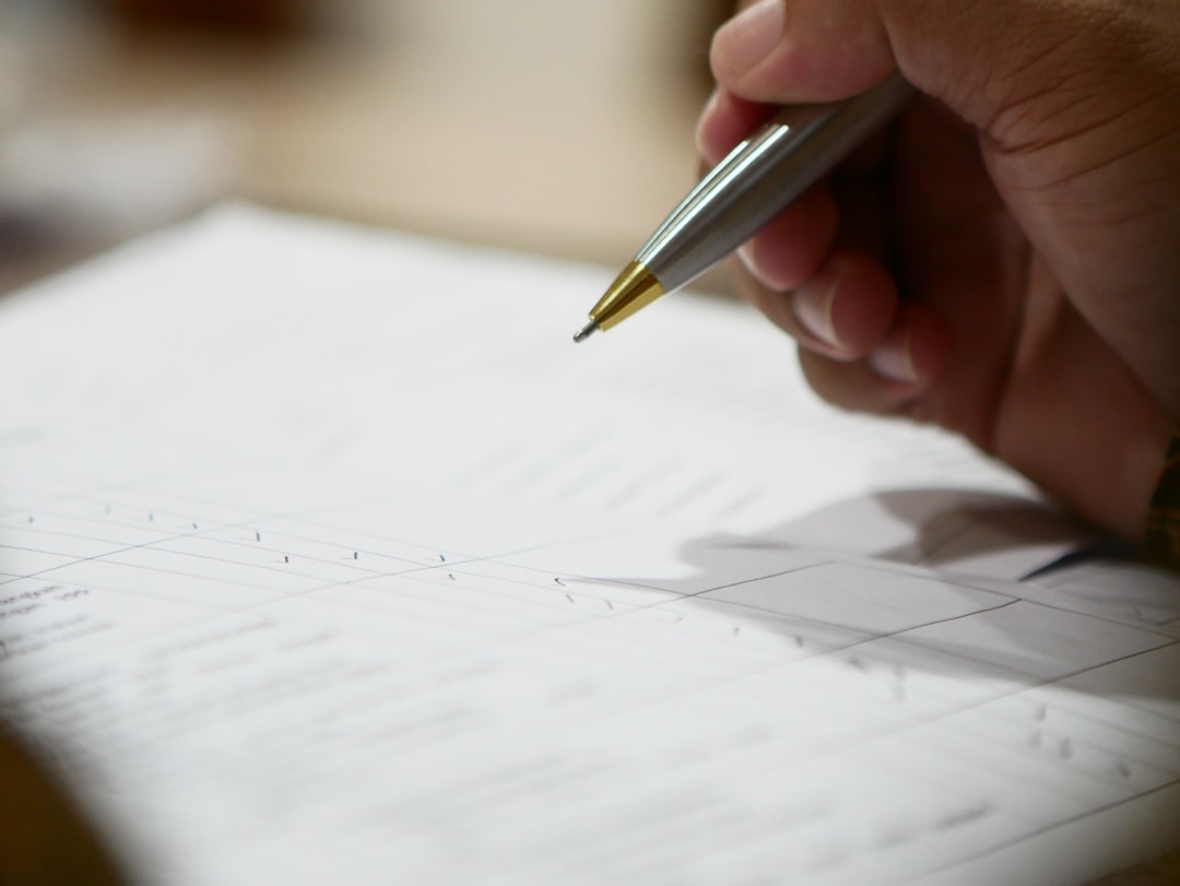 contract document with pen close up