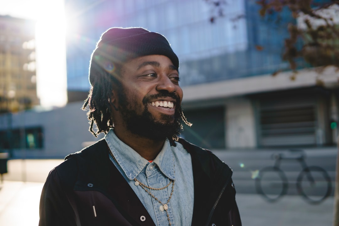 man outdoor natural light portrait smiling